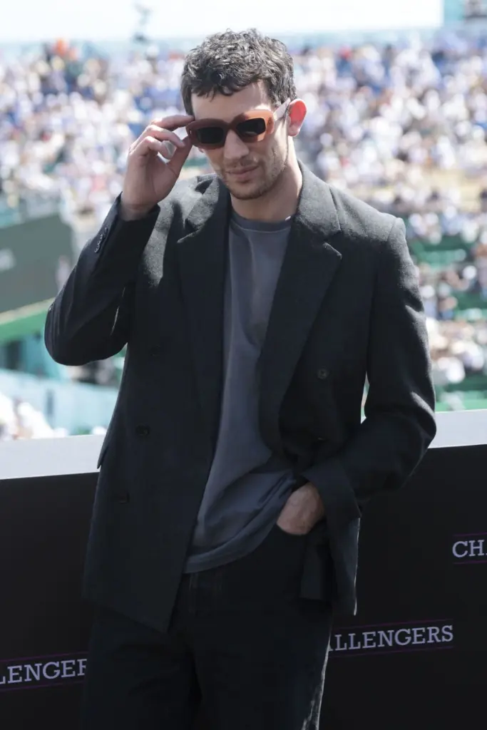 Josh oconnor challengers press tour suit with statement glasses