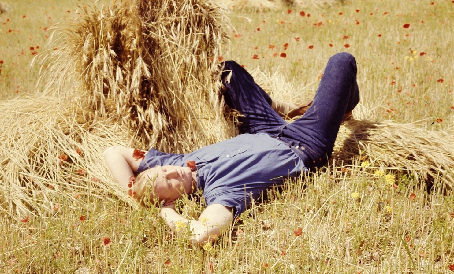 Portrait of American Olympic fencer Kin Hoitsma laying down in a field. *** Local Caption *** Kin Hoitsma;