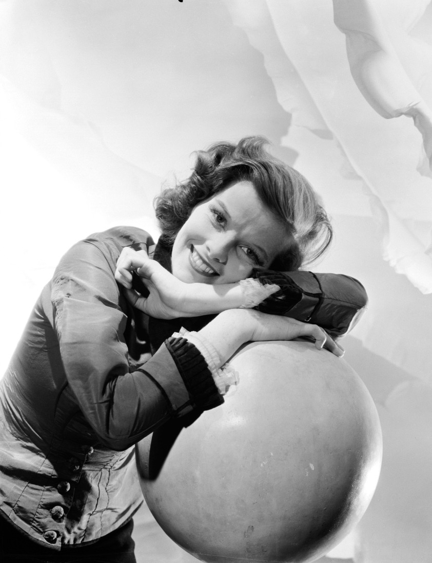 Portrait of actress Katharine Hepburn resting her head on a sphere.  *** Local Caption *** Katharine Hepburn;